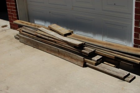 make fence posts into a rustic wood bed, The Accent Piece on Remodelaholic
