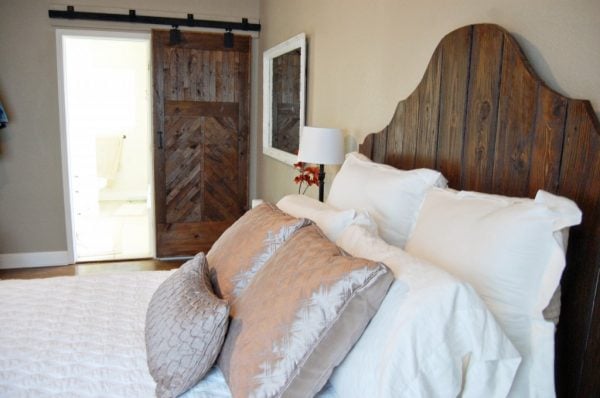 rustic wood bed and barn door, The Accent Piece on Remodelaholic